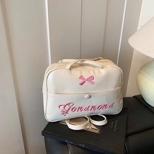 Chic beige backpack with pink bow detail and embroidery, stylish commute bag for women