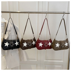 Hanging display of denim star pattern shoulder bags in black, brown, wine, and green