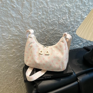 Elegante borsa hobo in velluto a coste bianco crema con fiocchi rosa e doppia zip