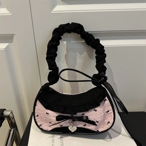 Pink nylon tote bag with floral embossing and black bow details for women