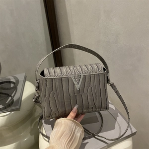 Chic grey crocodile embossed leather handbag with silver V-shaped buckle for women