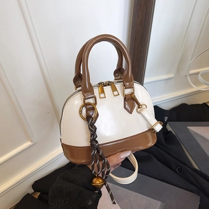 Retro shell-shaped handbag in white and brown leather with shoulder strap
