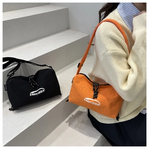 Detail showing high-quality nylon texture and drawstring closure on minimalist bags