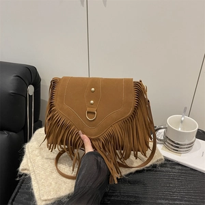 Vintage brown suede saddle bag with long tassels and gold metal D-ring for women