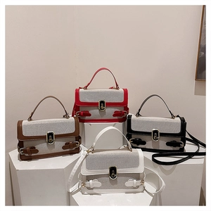 Detailed display of four retro canvas crossbody bags in brown red black and white