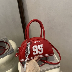 Red crescent moon underarm bag with Los Angeles print and sporty leather finish