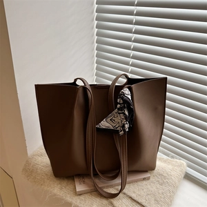Deep brown large capacity faux leather tote bag with decorative silk scarf on handle