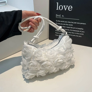 Elegant white 3D rose texture handbag with circular handle and silver zipper closure