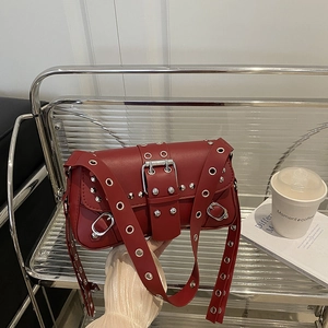 Chic dark red studded motorcycle hobo bag with silver metallic hardware and rivets