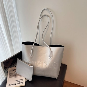 Silver large capacity tote bag set with embossed lettering for stylish commuting