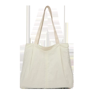 Chic cream nylon tote bag with leather logo patch for stylish women's daily commute