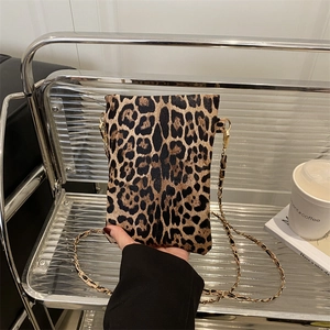 Fashionable leopard print handbag with golden chain strap for stylish urban women