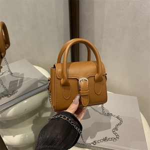 Retro caramel leather handbag with silver clasp and metal chain strap for women