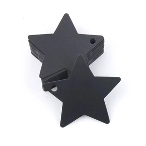 Black star-shaped matte cardstock gift tags with pre-punched holes for DIY packaging