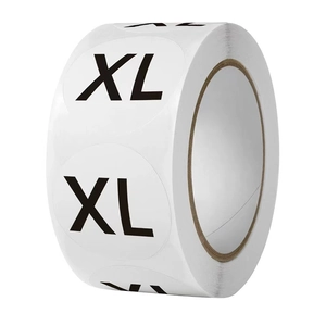 Roll of white circular XL size stickers for clothing labels with black bold lettering