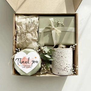 Elegant gift set with ceramic mug and thank you card in a gift box with floral decor