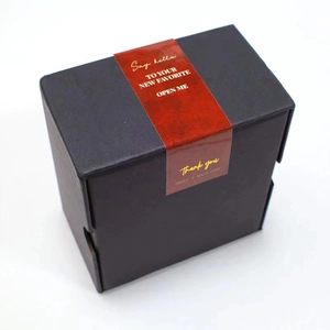 Rectangular matte black gift box with a red waterproof 'Open Me' thank you seal sticker
