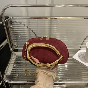 Retro burgundy round evening clutch with gold horseshoe handle and chain strap
