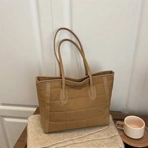 Brown quilted nylon tote bag for women with leather straps and spacious puffer design