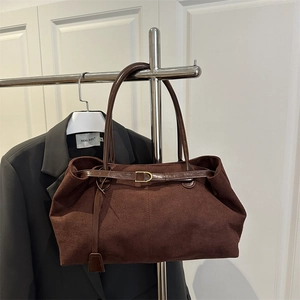 Retro caramel brown tote bag in premium suede with metallic buckle for autumn commuting