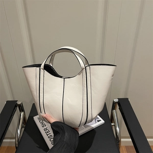 Sac seau blanc élégant avec bords noirs pour femme, sac à main tendance automne 2025