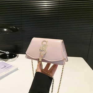 Pink crossbody square bag with gold tassel, metal chain strap and logo decoration