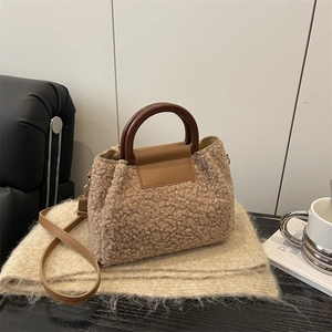 Chic leopard print teddy fleece handbag with wooden handle and leather crossbody strap