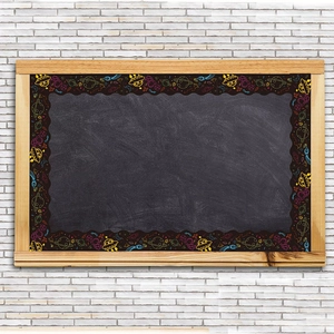 Space themed bulletin board borders with UFO and rocket patterns on black background