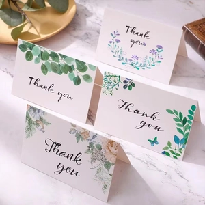 Set of floral Thank You cards with eucalyptus and daisy designs on marble background