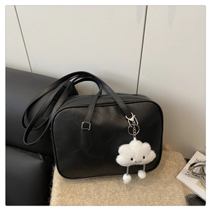Black retro bowling bag with matte leather texture and cute white cloud charm detail