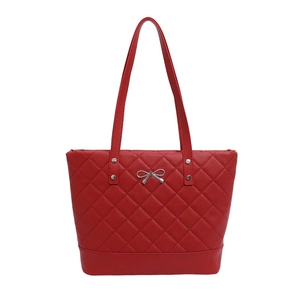 Red quilted faux leather tote bag with silver metal bow detail and elegant shoulder straps