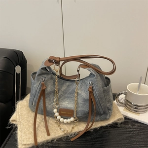 Vintage denim tote bag with leather straps and pearl chain detail for women