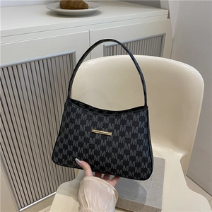 Minimalist grey bucket bag with M-letter print and gold metal bar detail for women