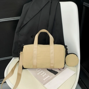 Women Minimalist Nylon Cylinder Shoulder Bag With Small Round Pendant Purse Casual Solid Color Crossbody Handbag Daily Bag