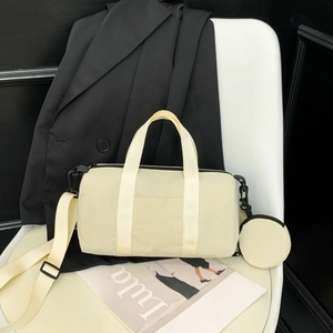 Chic cream nylon cylinder crossbody bag with matching round coin purse and wide strap