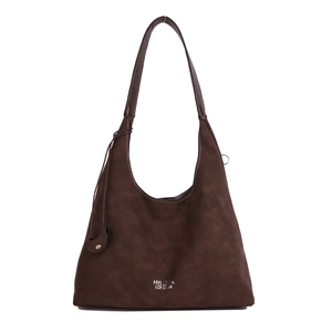 Retro brown oversized tote bag in suede texture with white stitching and shoulder strap