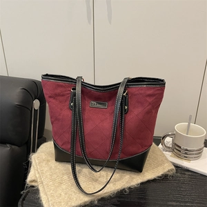 Burgundy quilted tote bag in suede and leather patchwork for commute and casual style