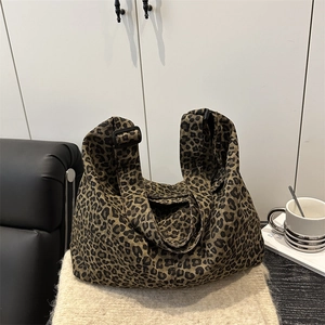 Large leopard print canvas tote bag with adjustable black strap for women
