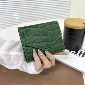 Elegant dark green crocodile-embossed patent leather envelope clutch bag for women