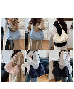 Model lifestyle shots of the large capacity nylon crescent bag in four versatile colors