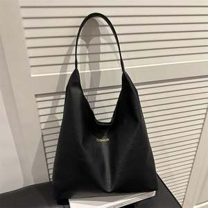 Minimalist black oil wax leather tote bag with fashion lettering for women