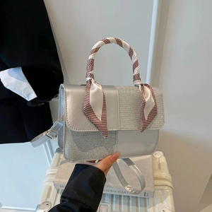 Silver拼接 textured large capacity crossbody bag with silk scarf handle on suitcase