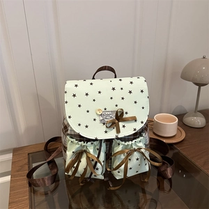 Retro mint green oxford fabric mini backpack with star patterns and a brown bow detail