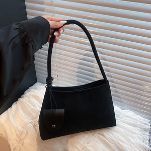 Retro black suede underarm bag with knot detail and matching mini coin purse charm