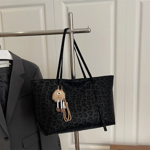 Large leopard print tote bag in dark grey suede with a cute plush doll charm