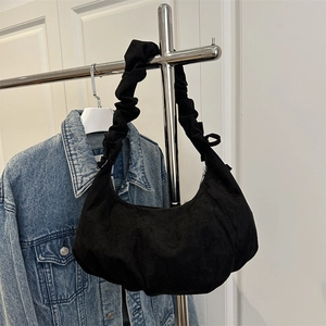 Fashionable black matte hobo bag with scrunchie strap and crescent shape design