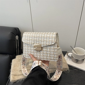 French tweed underarm bag with ethnic embroidery strap and vintage gold buckle