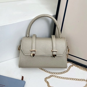 Chic Saffiano leather underarm bag in light sage green with gold chain strap
