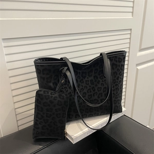 Chic black leopard print tote bag set with matching pouch and faux leather shoulder straps