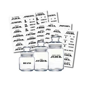 Waterproof transparent kitchen pantry labels set on clear glass storage canisters